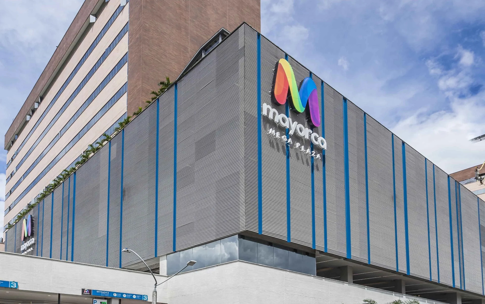 Commercial building with architectural louver screen facade in a coastal environment