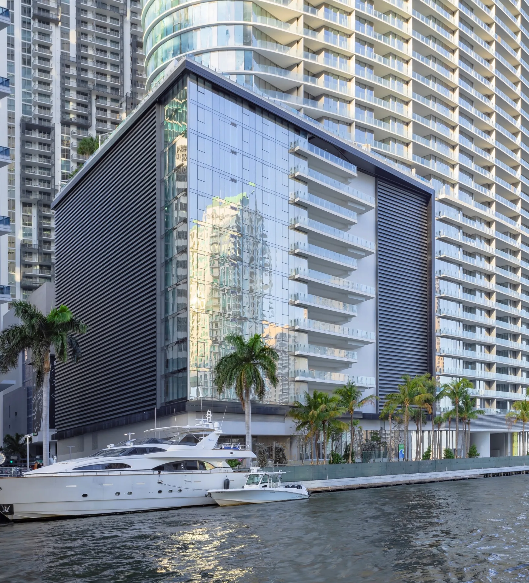 Waterfront building with architectural louver screen facade