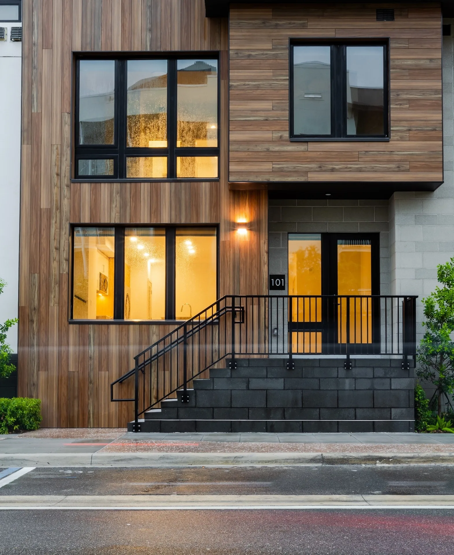 Wood look architectural cladding at a building entrance